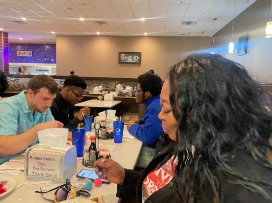 Chuck with some of the US Cast in their Rainbow film at a Buffet restaurant in Boston